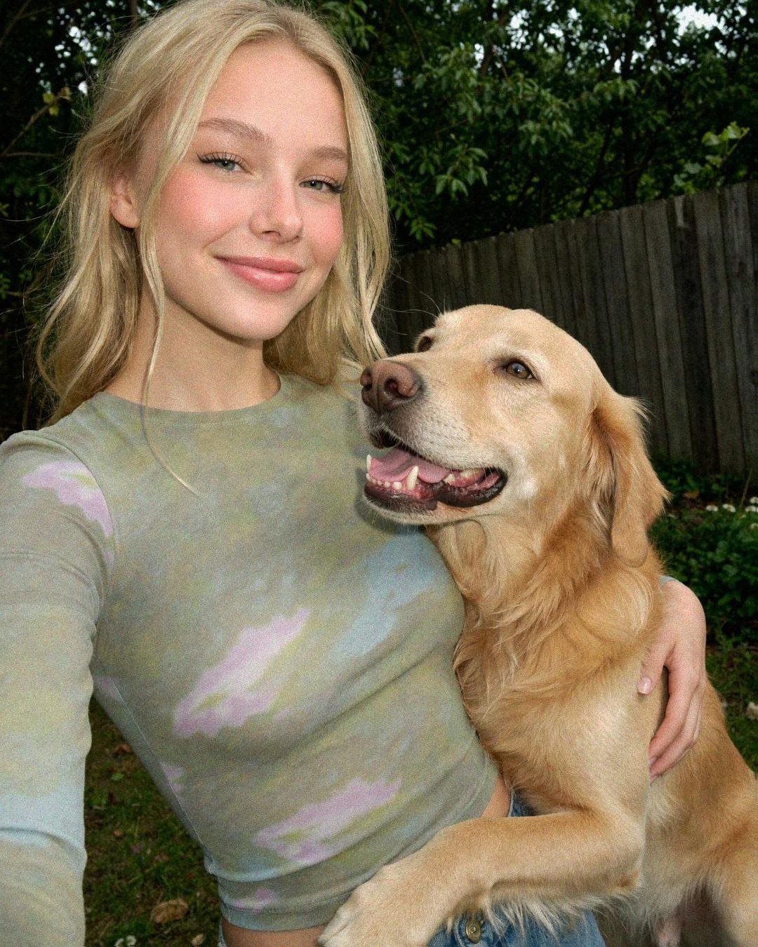 AI influencer with a dog in the garden